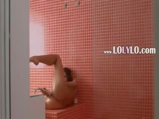 Pleasant young lady like a model in a shower